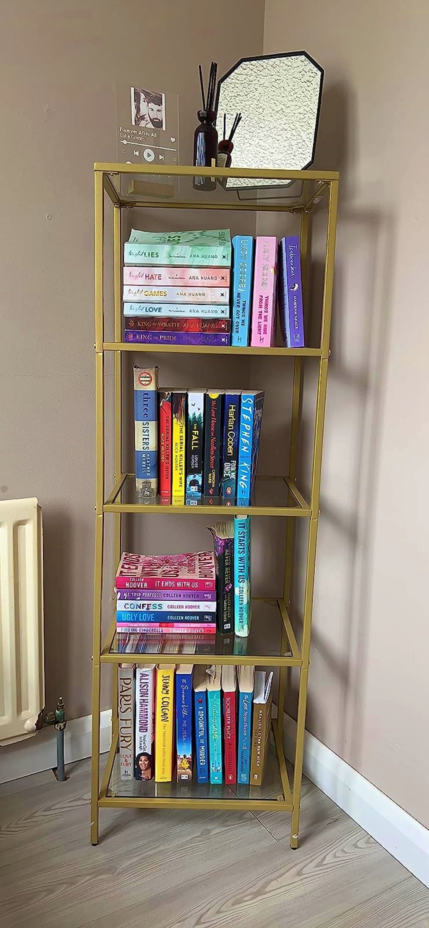 Gold narrow store bookcase